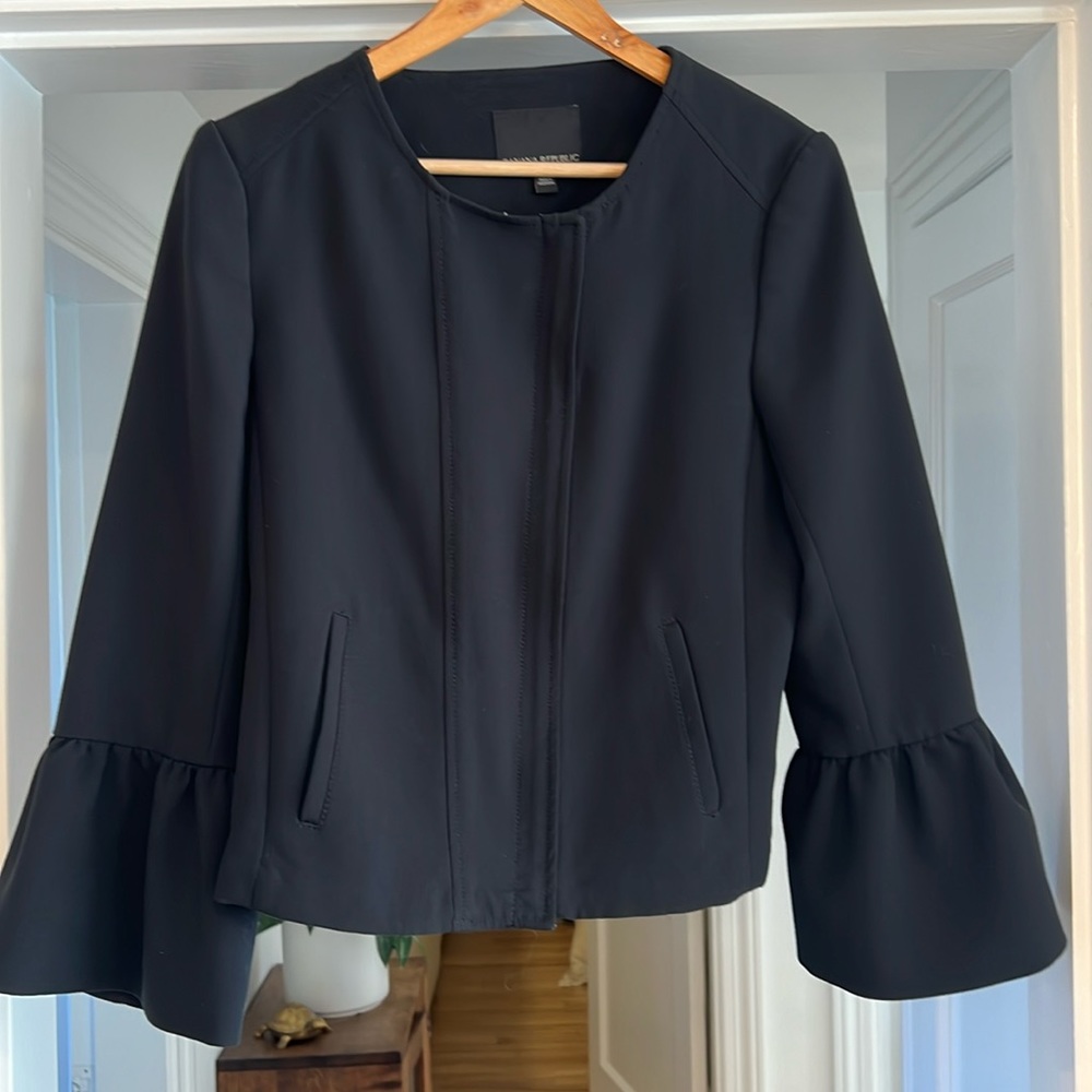 Black Banana Republic blazer with zipper and bell sleeves.